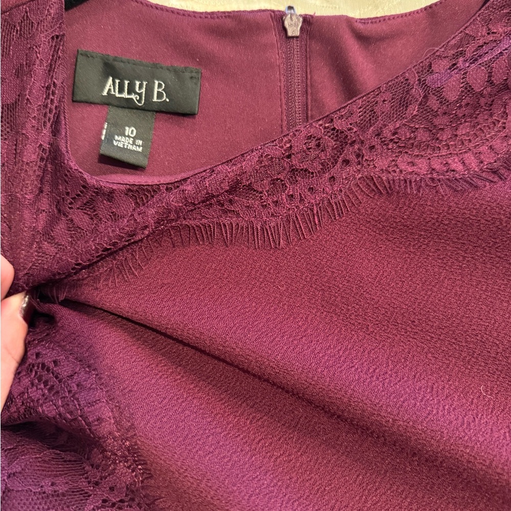 Ally B.  Girls size 10 maroon dress (gently worn) great condition.